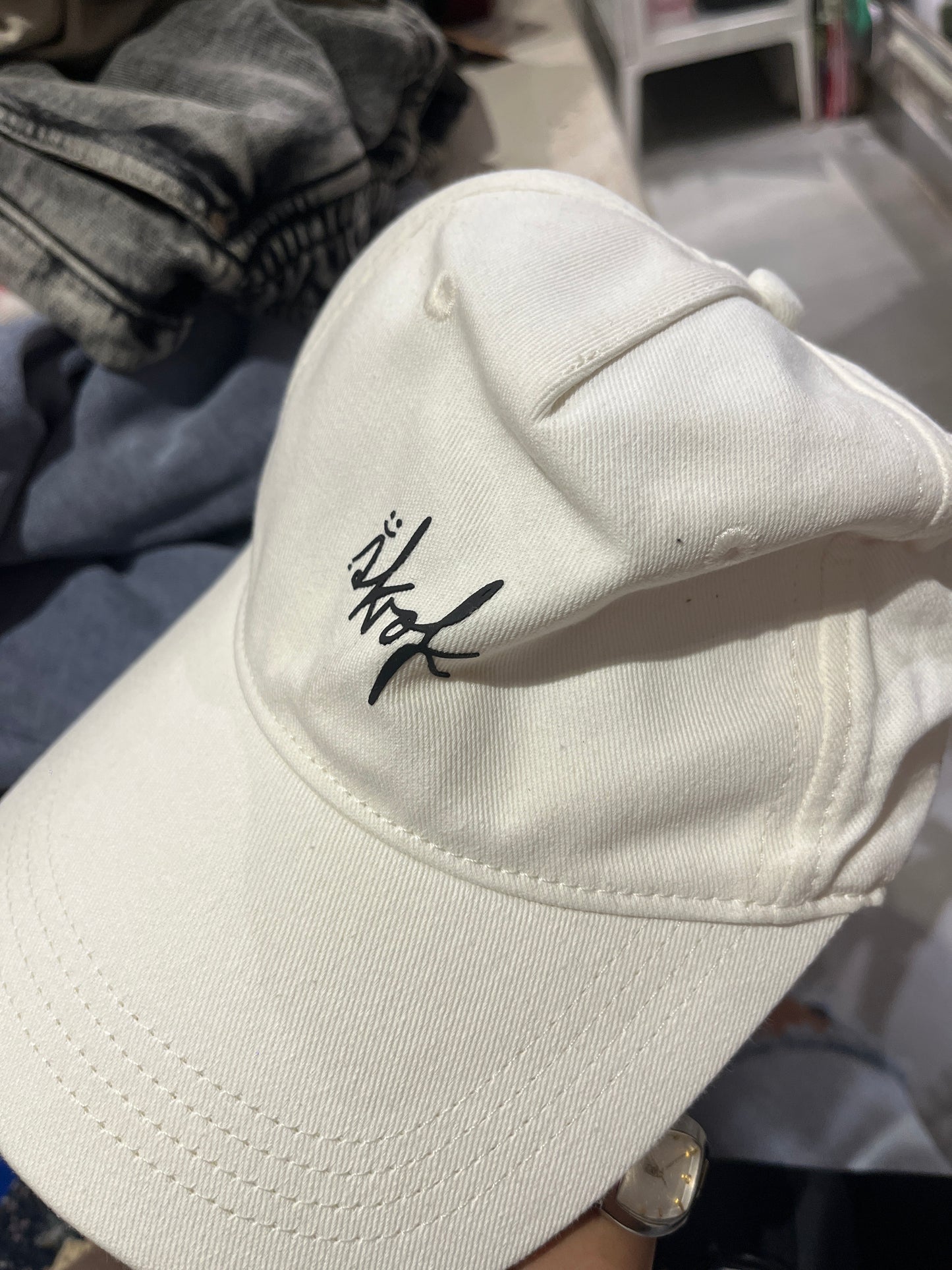 White cap with black details