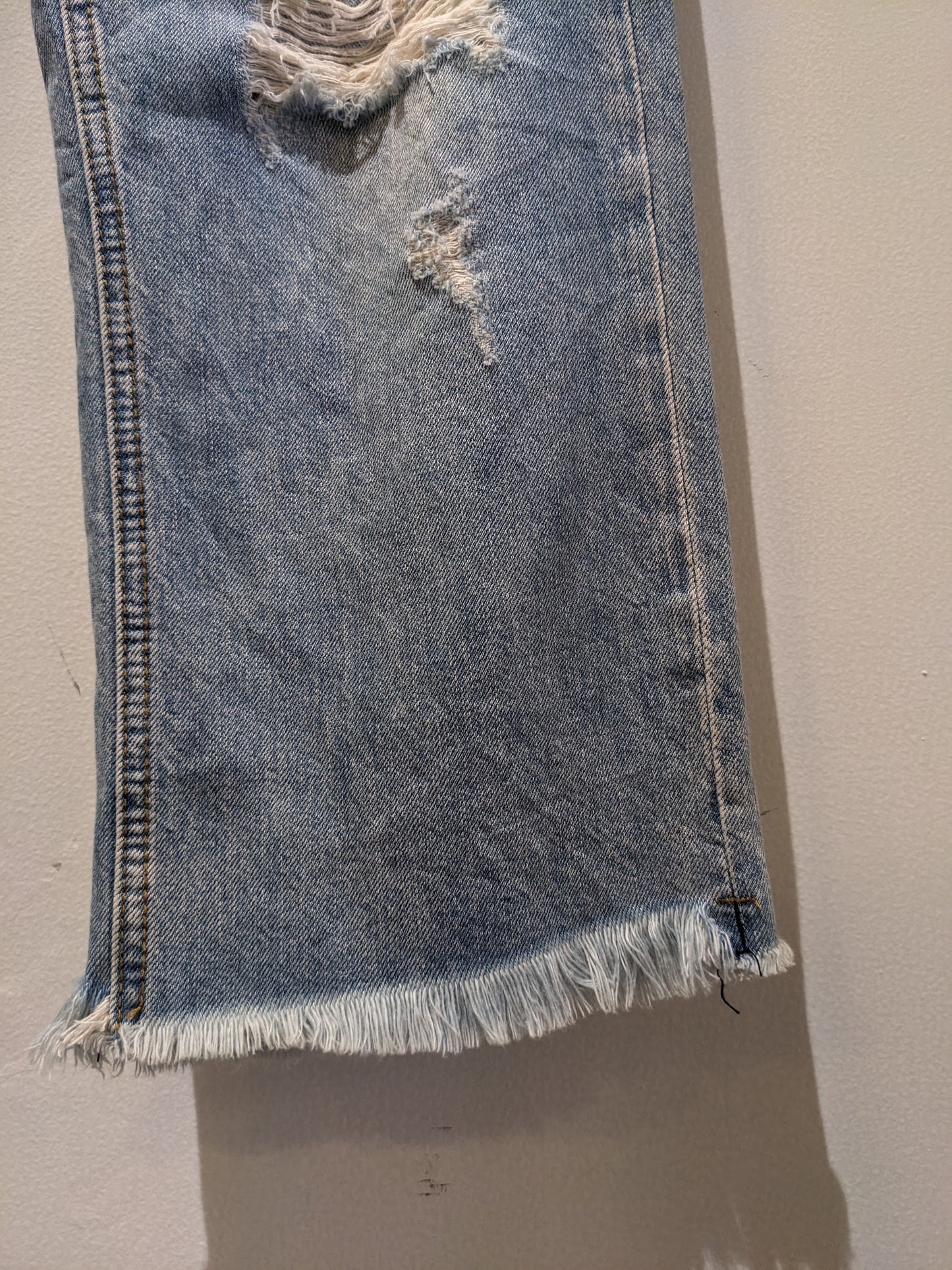 Light Blue Ripped Jeans With Funky Backpocket Patches