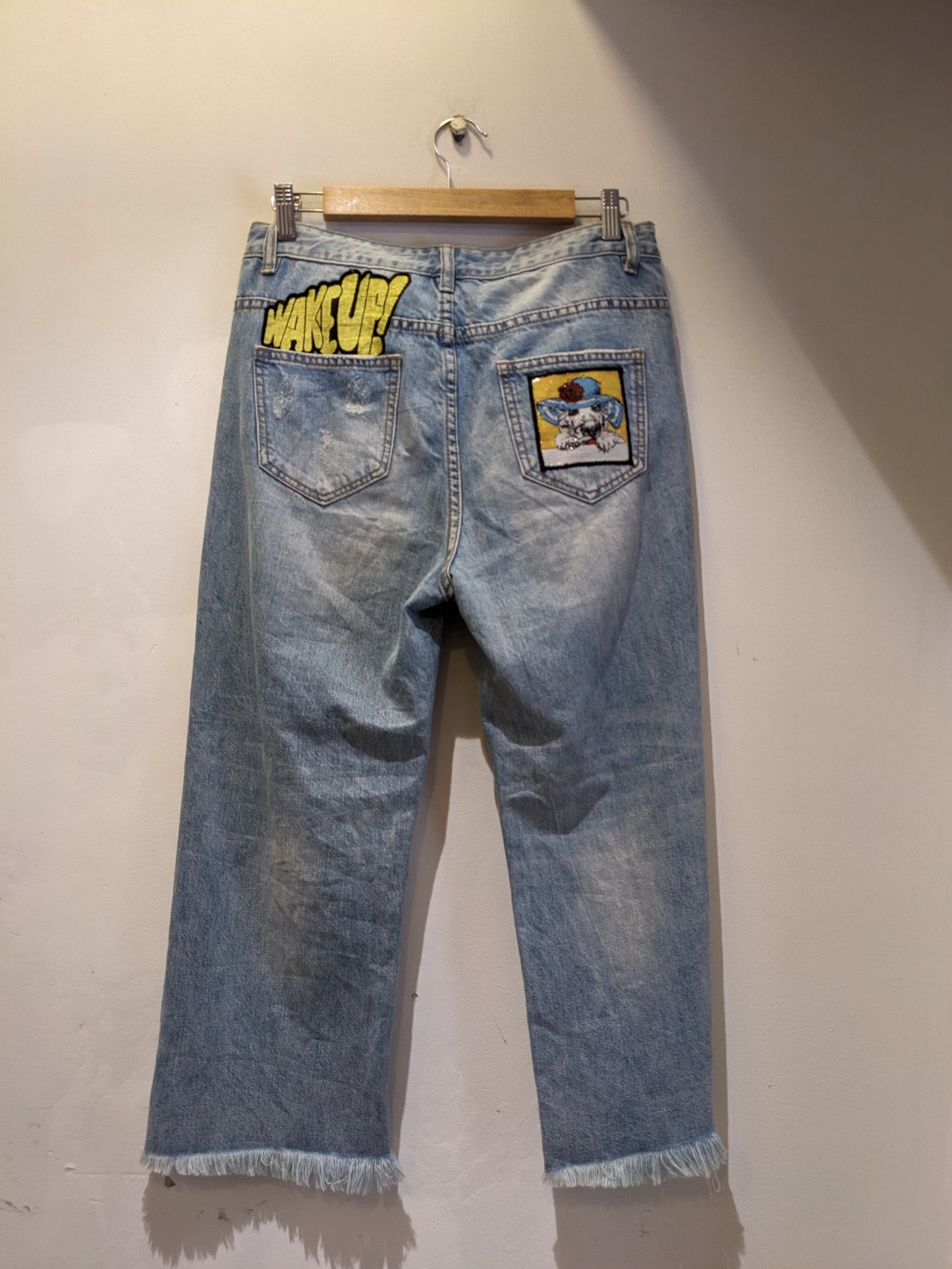 Light Blue Ripped Jeans With Funky Backpocket Patches