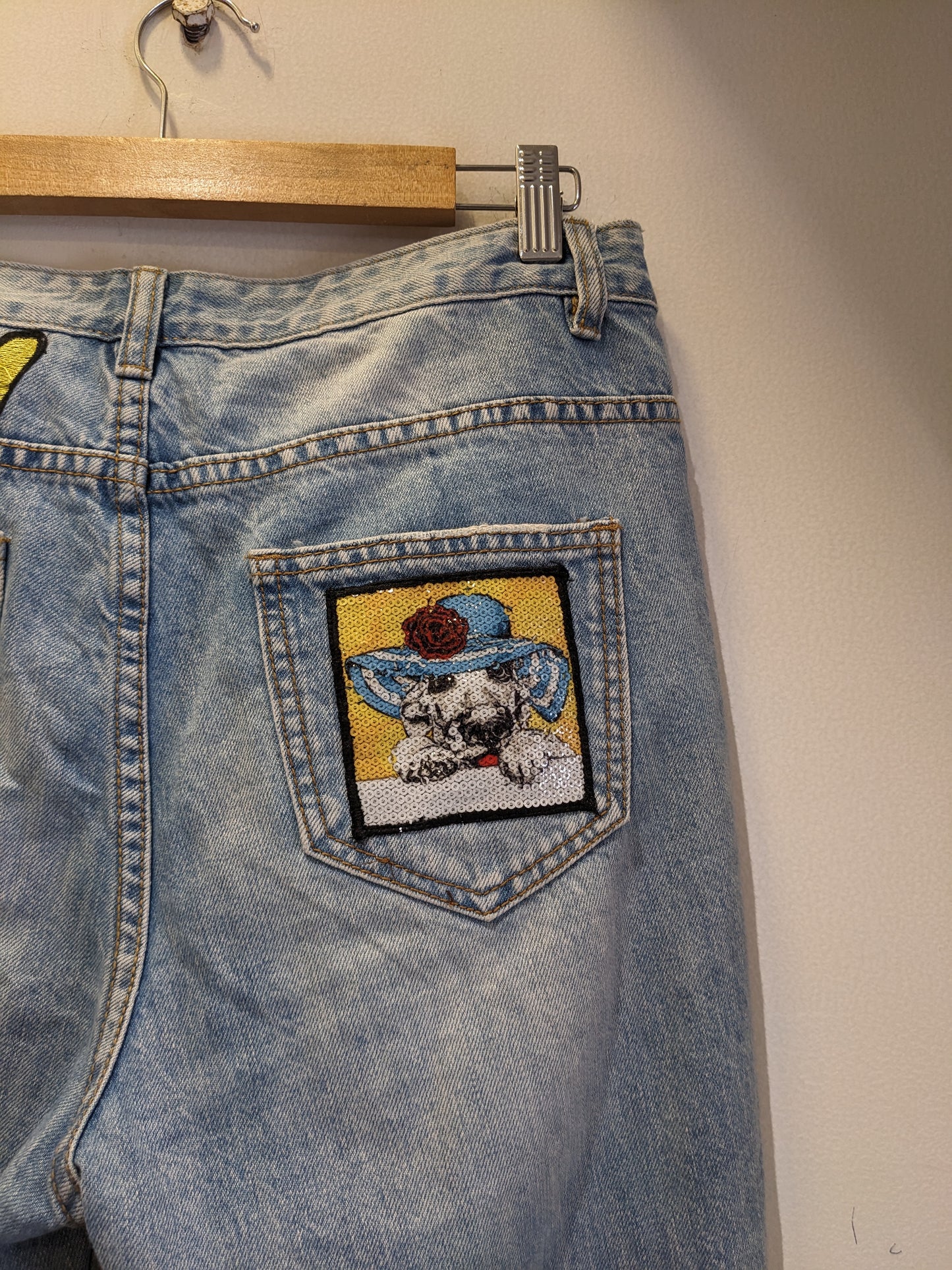 Light Blue Ripped Jeans With Funky Backpocket Patches