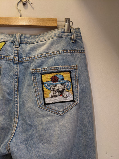 Light Blue Ripped Jeans With Funky Backpocket Patches