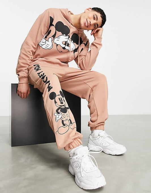 ASOS DESIGN trackies with Disney Mickey Mouse print in brown (part of a set)